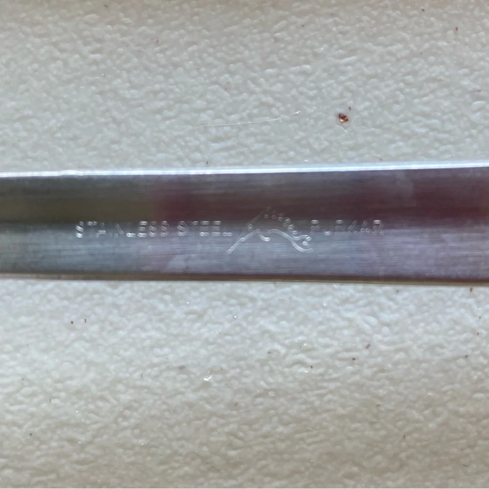 Elegant stainless steel serving spoon